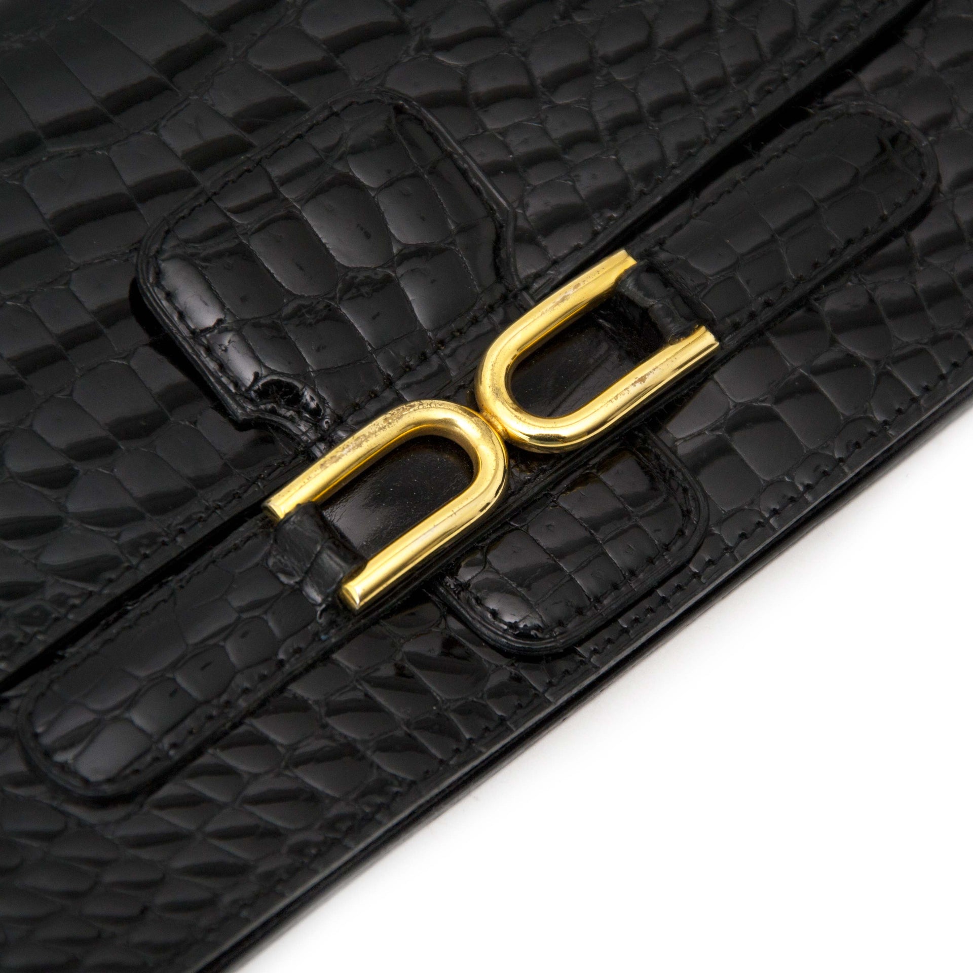 Bent u op zoek naar een iconische Delvaux Croco Wallet?