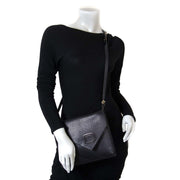 Delvaux Black Leather Crossbody Bag now for sale at labellov vintage fashion webshop belgium