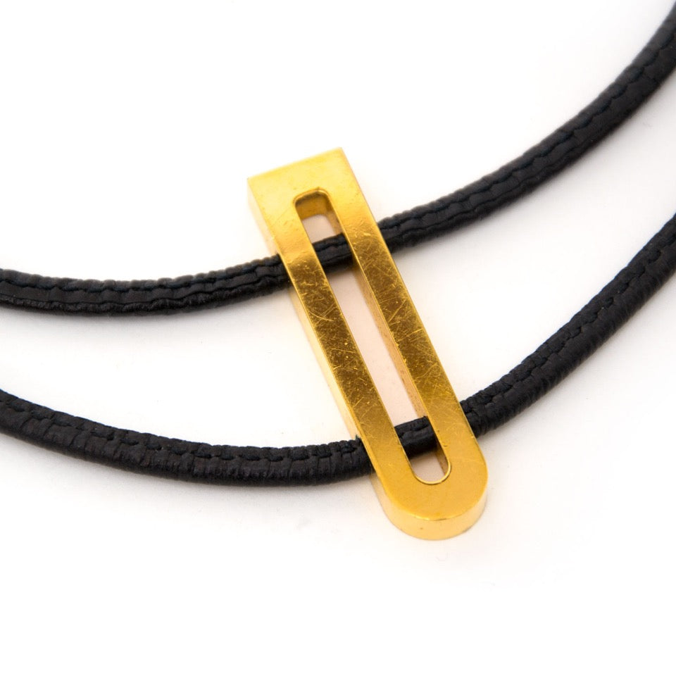 secondhand Delvaux 'D' Leather Necklace aan de beste prijs online te koop