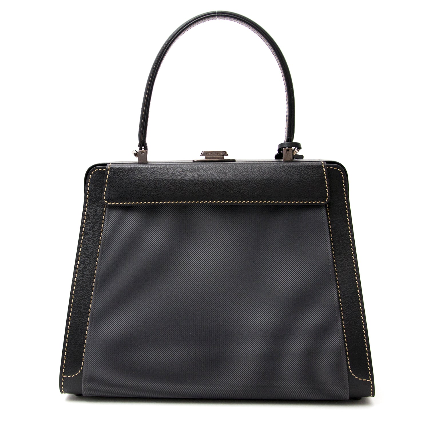 Buy vintage Delvaux Illusion black handbag for the best price at Labellov webshop. Safe and secure online shopping with 100% authenticity. Acheter vintage Delvaux Illusion noir sac à main pour le meilleur prix.