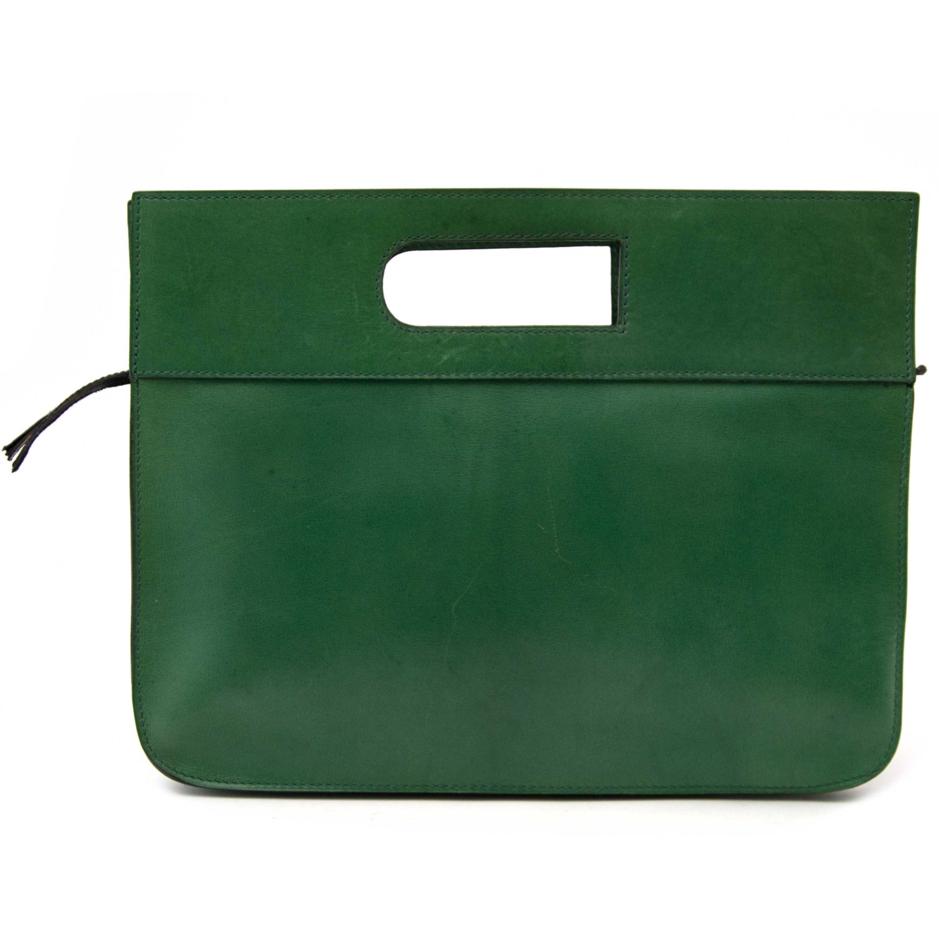 Buy and sell your authentic Delvaux Green Leather D Clutch and designer accessories