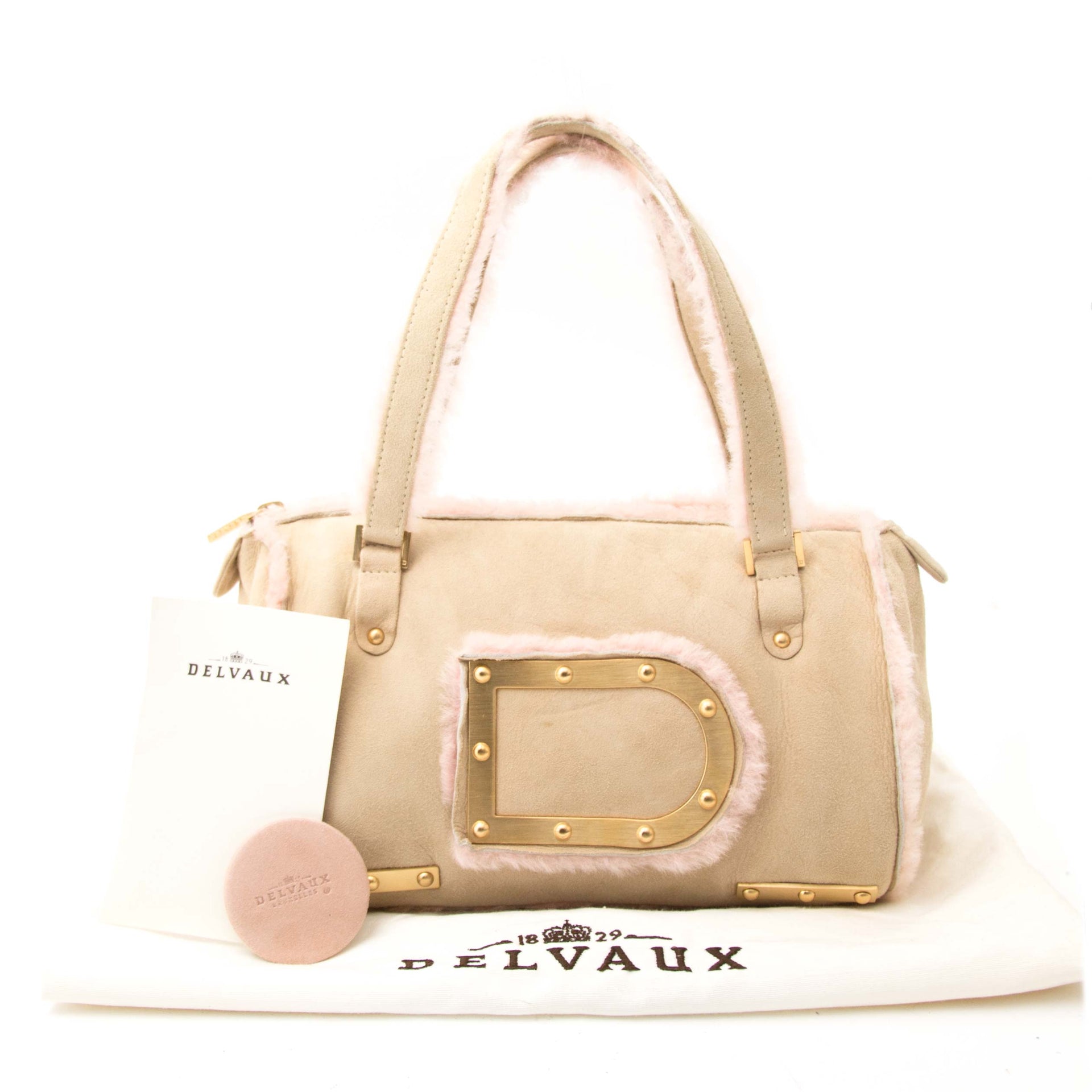 Bent u op zoek naar een authentieke Delvaux Le Astrid MM Mouton Retourné Beige Perla?