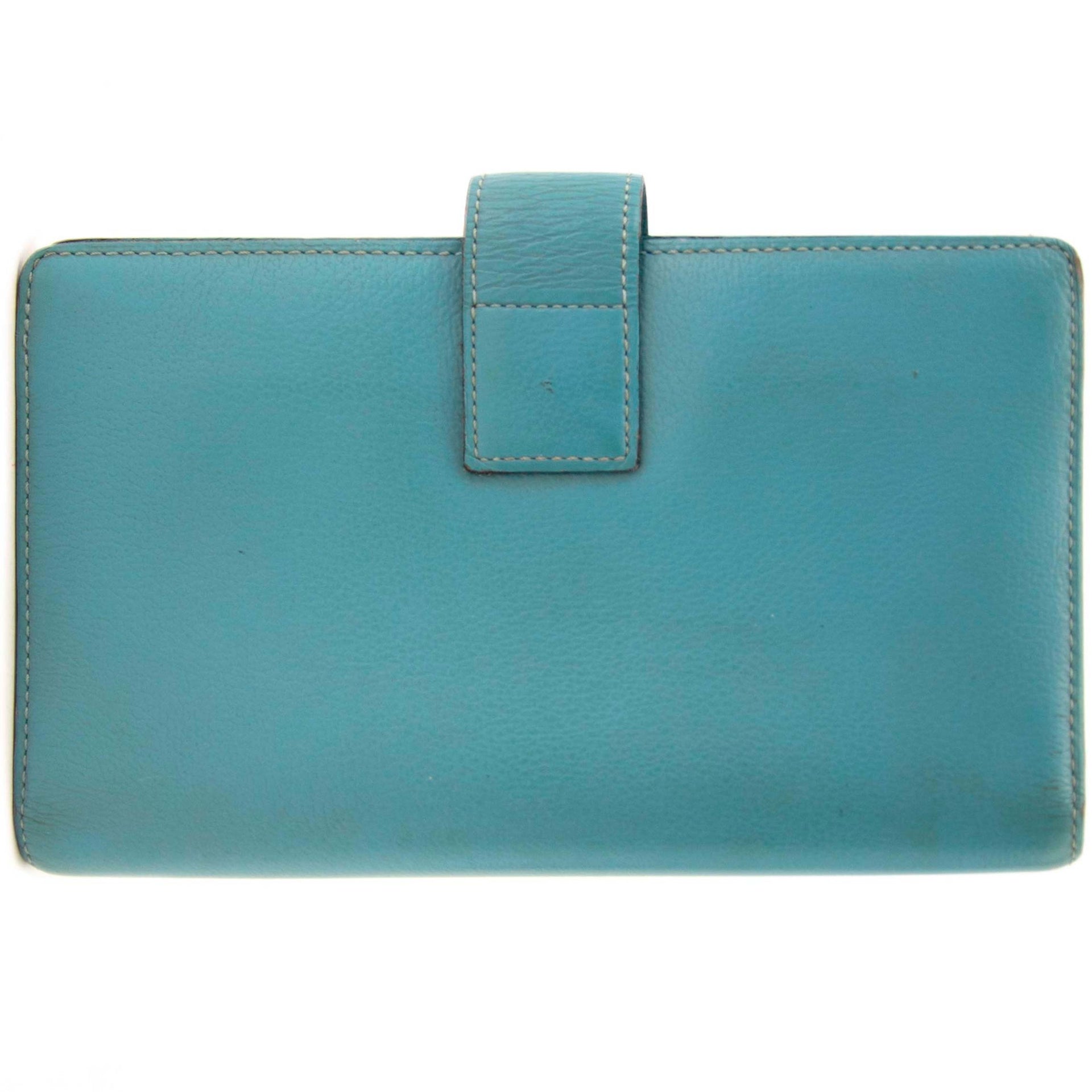 buy secondhand authentic delvaux light blue wallet at Labellov, online vintage webshop. Safe and secure shopping.