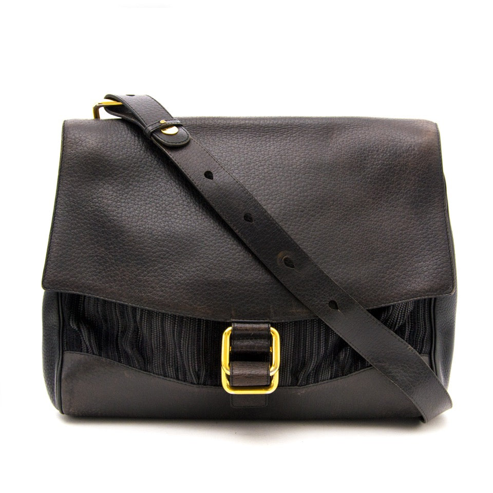 Buy and sell your Delvaux Black Leather Shoulder Bag for the best price online available.