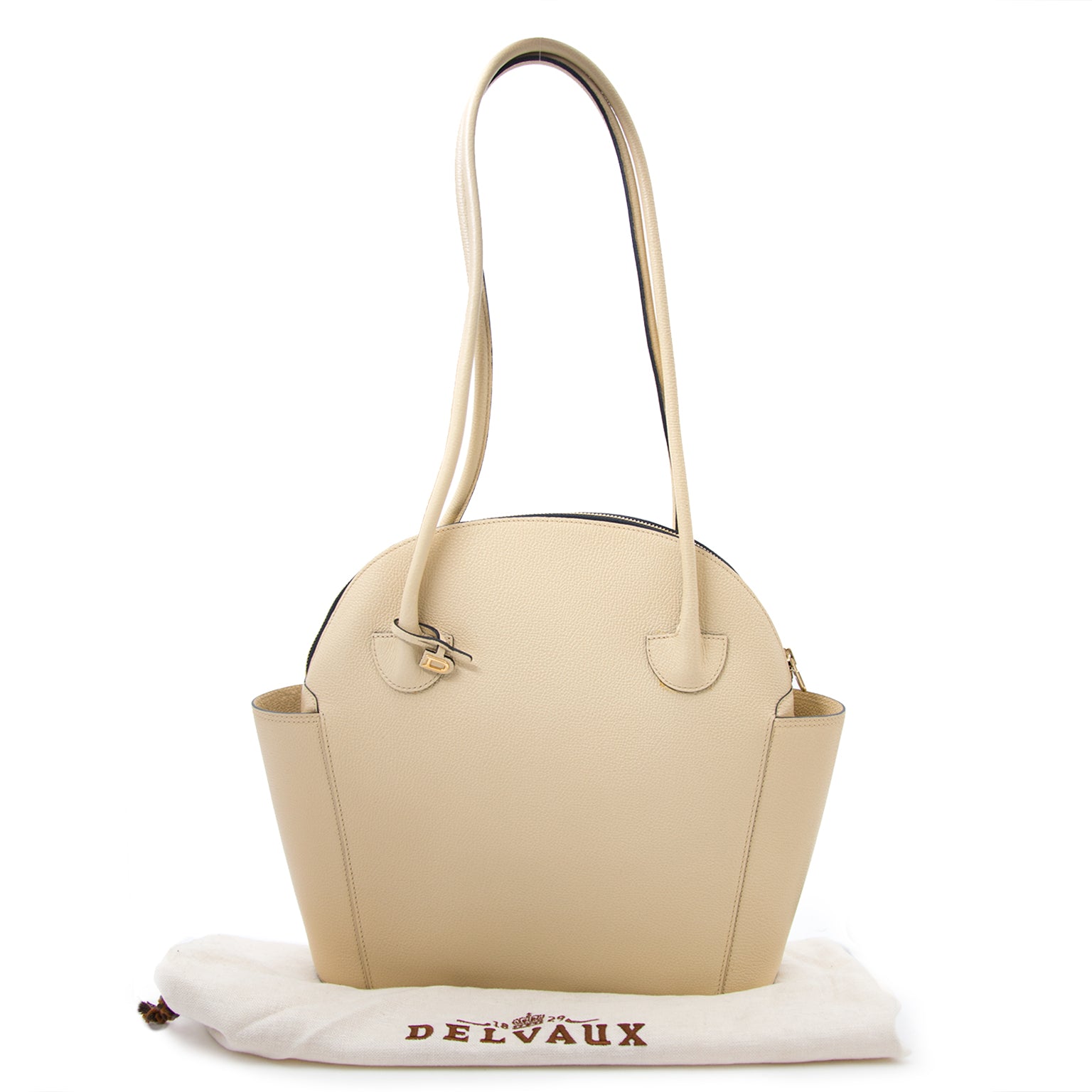 Deze crèmekleurige lederen Delvaux schouderhandtas is nu online verkrijgbaar op labellov.com.