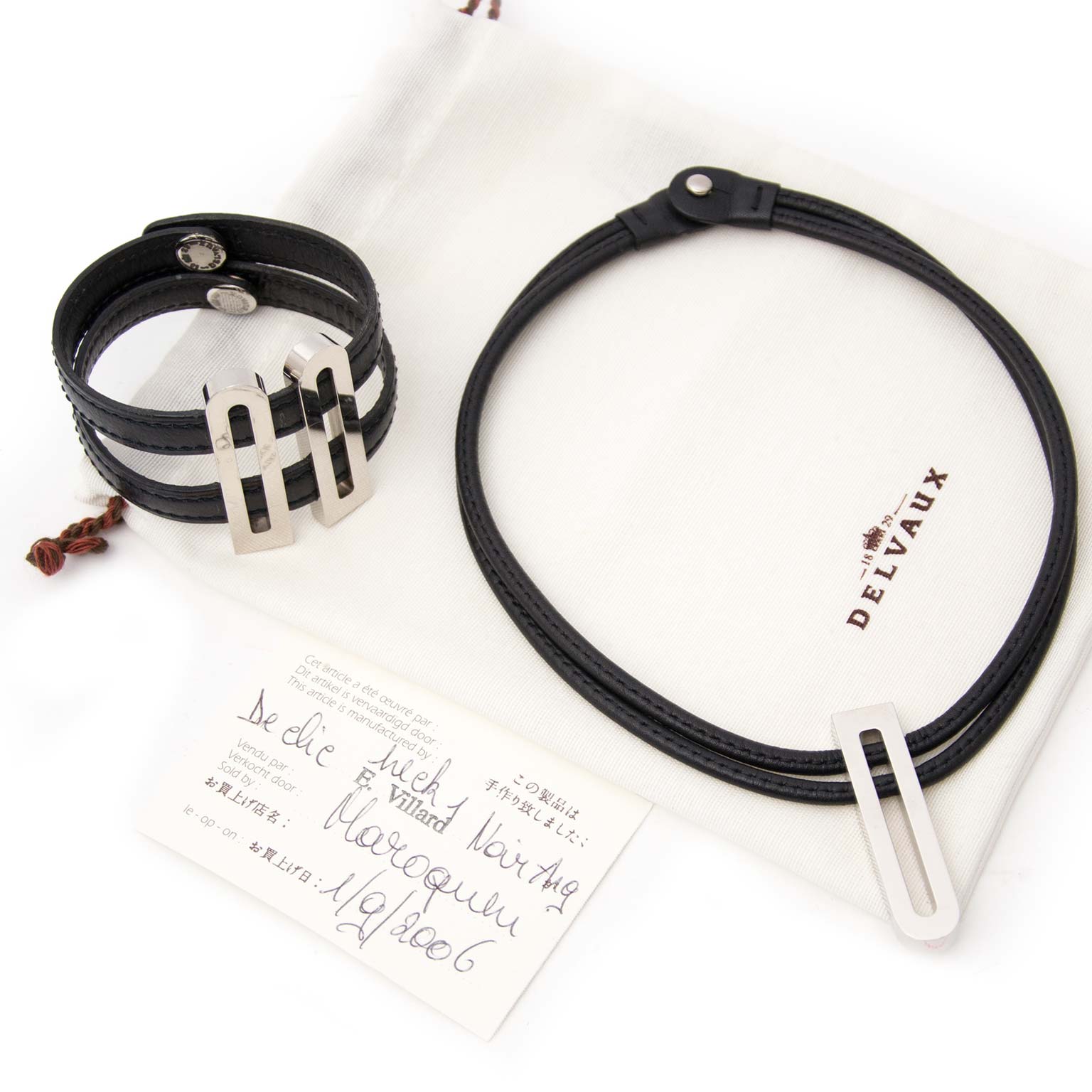 Ensemble bracelet et collier Delvaux en cuir et argent avec D