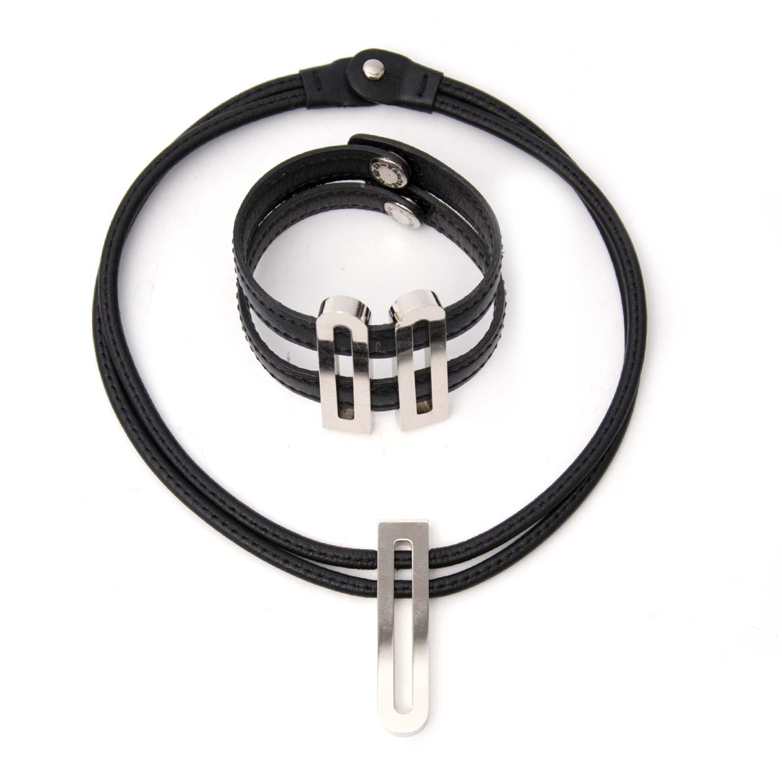 Ensemble bracelet et collier Delvaux en cuir et argent avec D