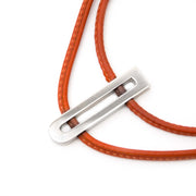 Are you looking for an Delvaux Orange Leather D Necklace?