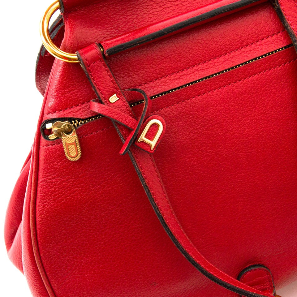 We buy and sell your secondhand Delvaux Mini Red Cerceau Jumping Bag for the best price