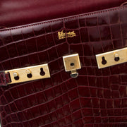 Shop your Delvaux Tempete PM Croc Bordeaux safe and secur at Labellov timeless luxury