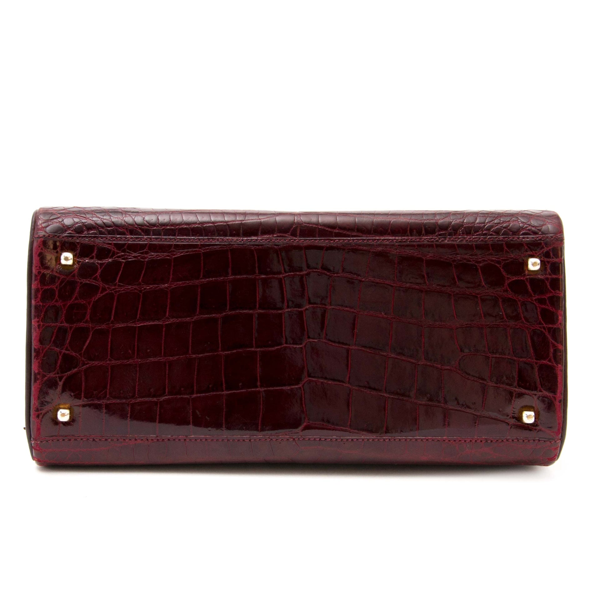Are you looking for an authentic Delvaux Tempete PM Croc Bordeaux?