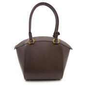 Delvaux Brown Pebbled Leather Bag available for the best price online at Labellov secondhand luxury.