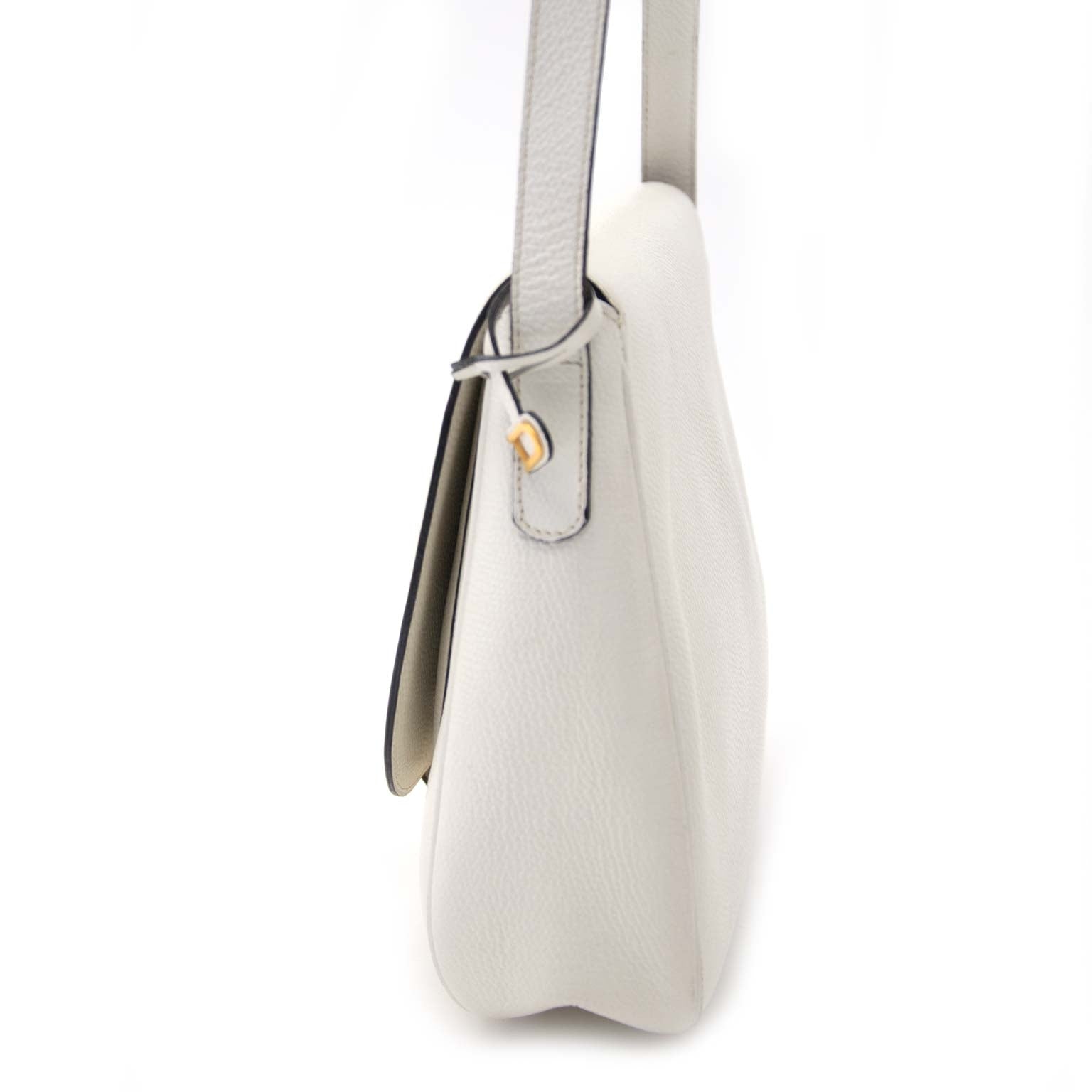 Preloved luxury shop Labellov sells a Delvaux White Pebbled Leather Shoulder Bag