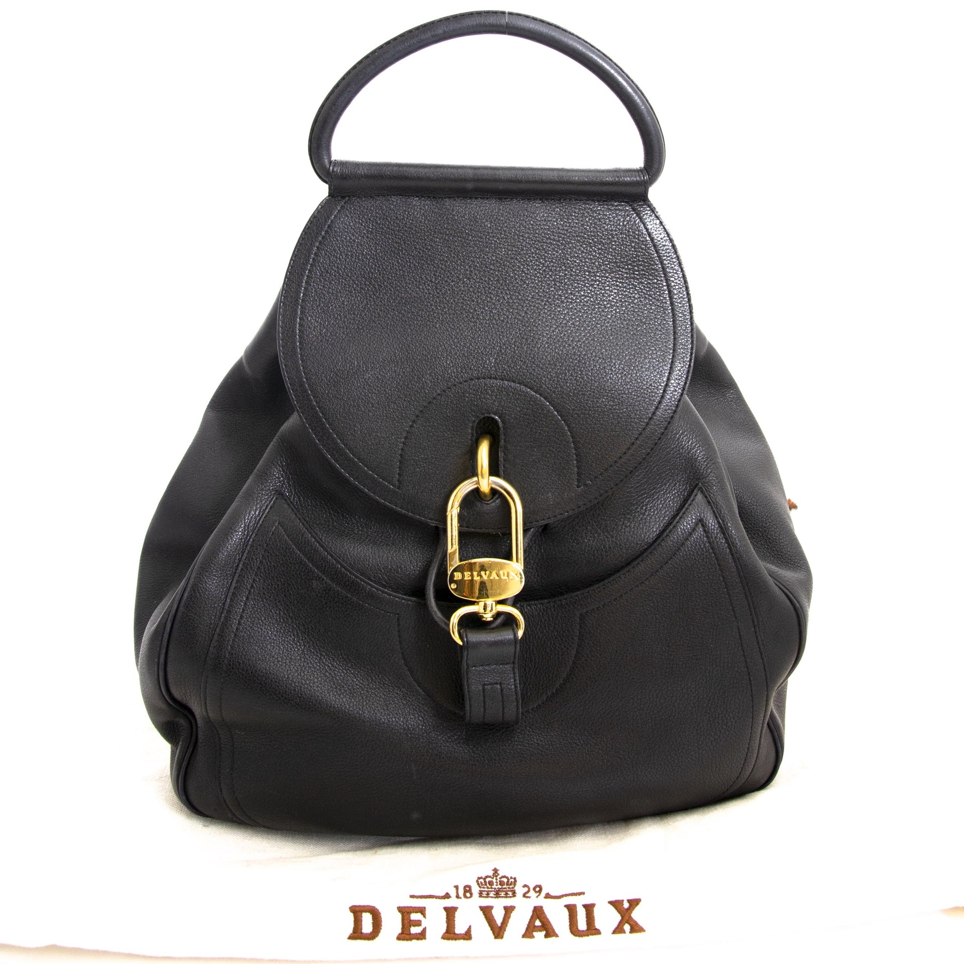 Travel handsfree in style wherever you go, with this all black Delvaux Leather Lucifer GM bag. veilig online aankopen tegen de beste prijs