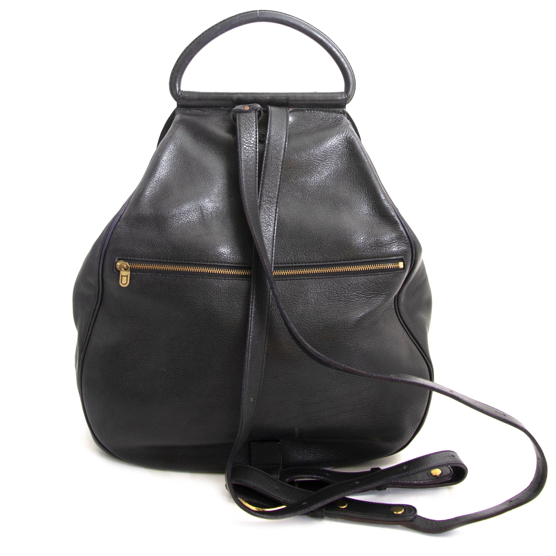 acheter en ligne seconde main Travel handsfree in style wherever you go, with this all black Delvaux Leather Lucifer GM bag.