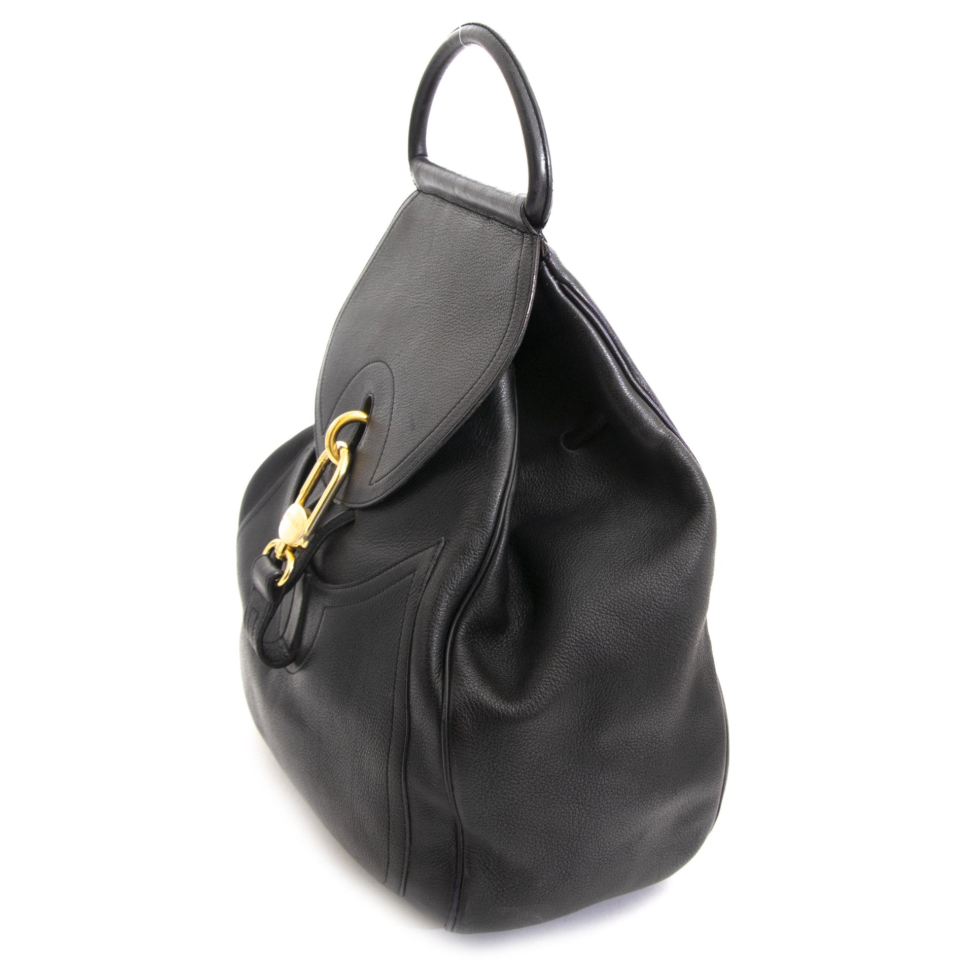 Travel handsfree in style wherever you go, with this all black Delvaux Leather Lucifer GM bag.