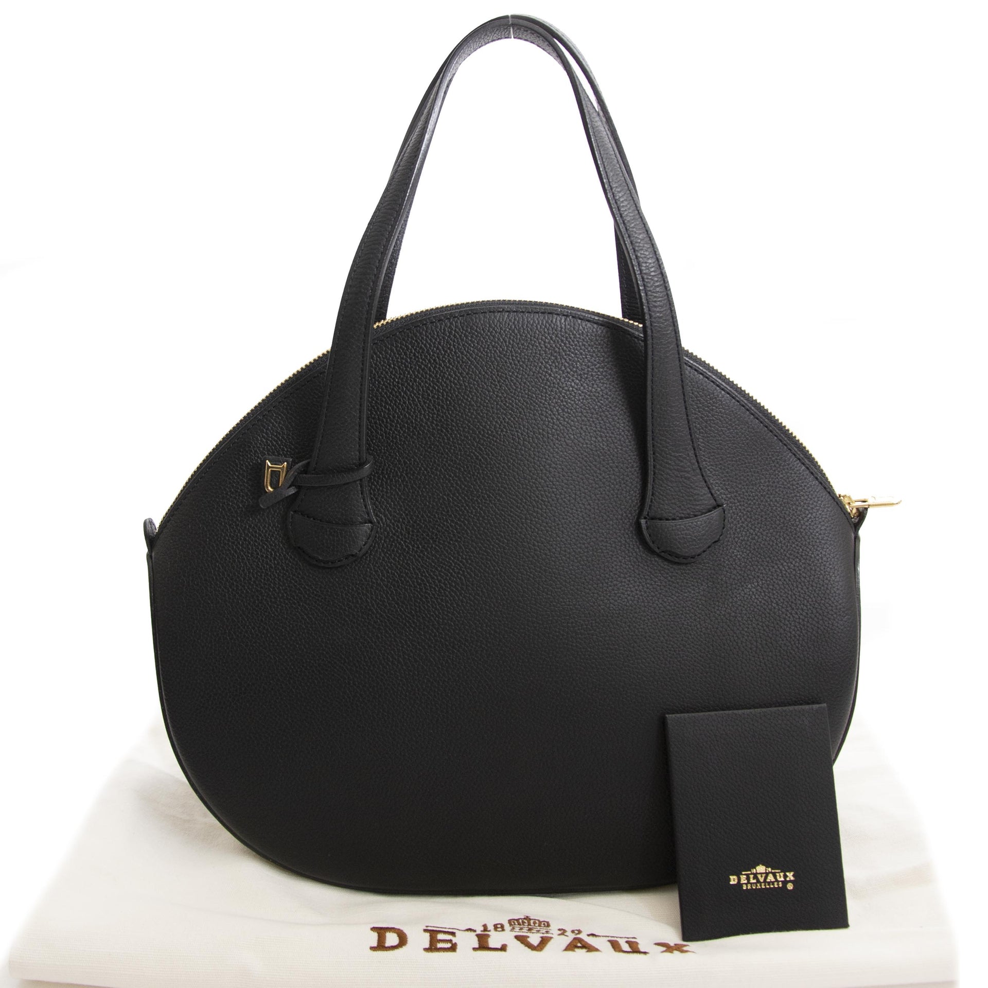 delvaux zwart ronde tas nu te koop bij labellov vintage mode webshop belgië aan de laagste prijs