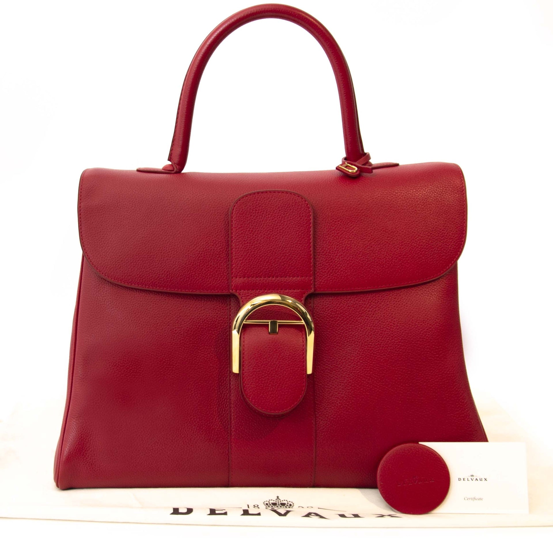 Delvaux GM Brillant Red 'Buy authentic secondhand Delvaux GM Brillant at the right price at LabelLOV, safe and secure online shopping. Koop authentieke tweedehands Delvaux GM Brillant aan de juiste prijs bij LabelLOV.'