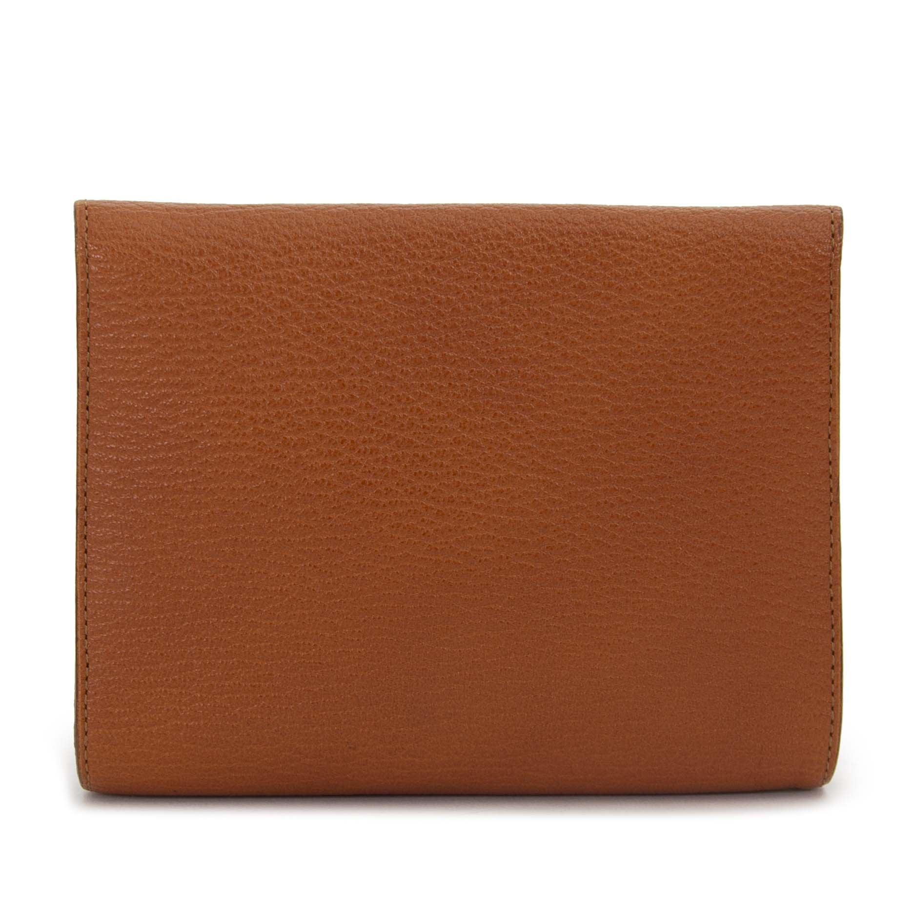 Delvaux Brillant Cognac Pouch kopen en verkopen aan de beste prijs