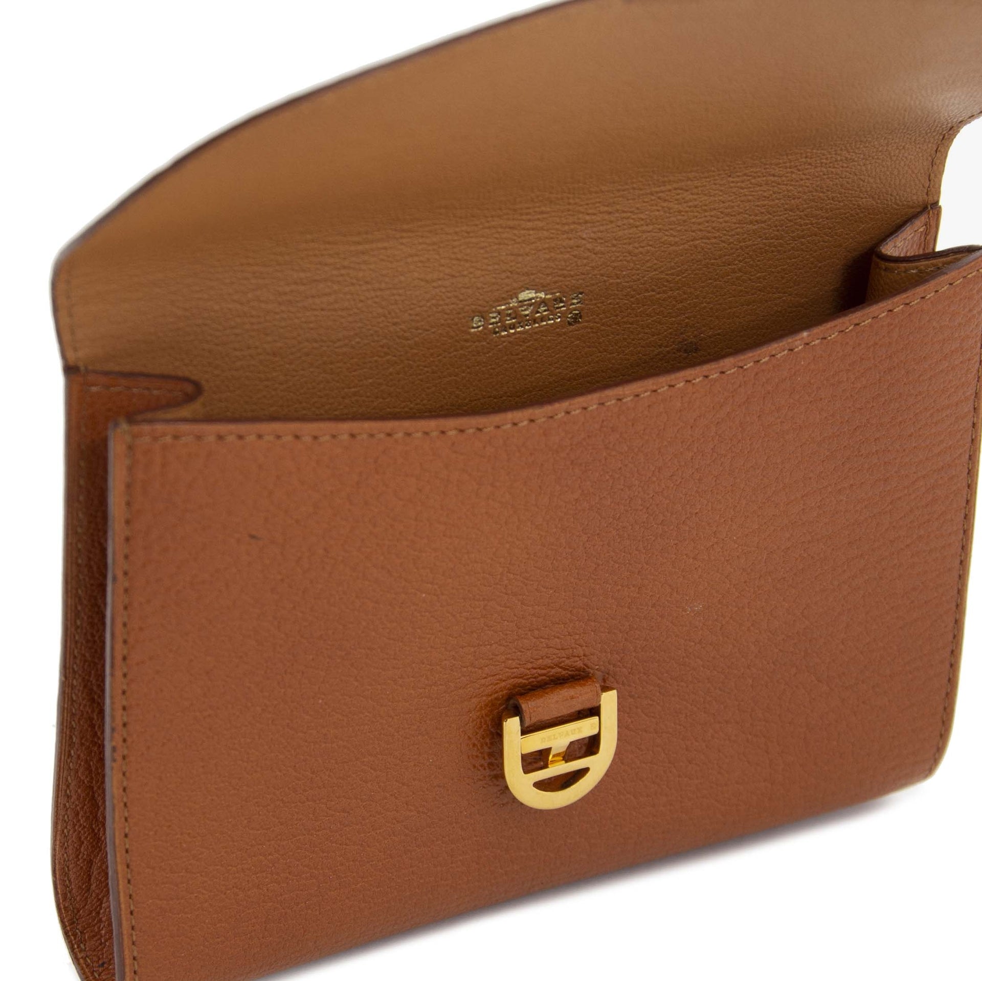 We buy and sell your authentic Delvaux Brillant Cognac Pouch