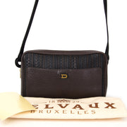 Authentieke Delvaux zwart bruin Toile de cuir cross body tas voor de juiste prijs bij LabelLOV vintage webshop. Delvaux Brown Black Toile de cuir cross body bag woven pattern. Veilig online winkelen. Luxe, vintage, mode. Antwerpen, België.