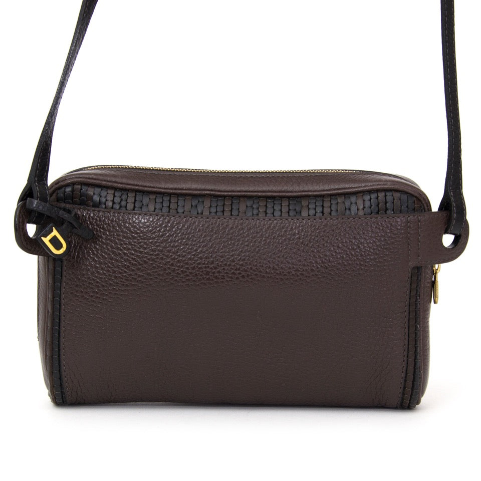 Buy Delvaux Brown Black Toile de cuir cross body bag woven pattern at the right price at LabelLOV vintage webshop. Luxe, vintage, fashion. Safe and secure online shopping. Antwerp, Belgium.