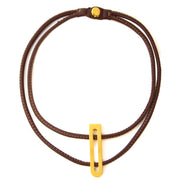 Delvaux Brown Leather Gold D Tag Necklace te koop aan de beste prijs bij Labellov