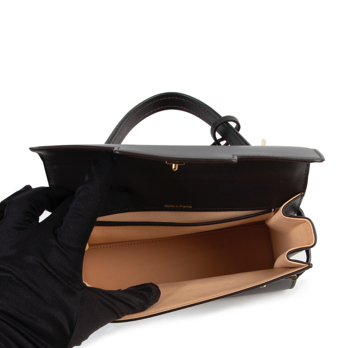 tweedehands nieuwe Delvaux Dark Brown Mini Tempete Calf Souple