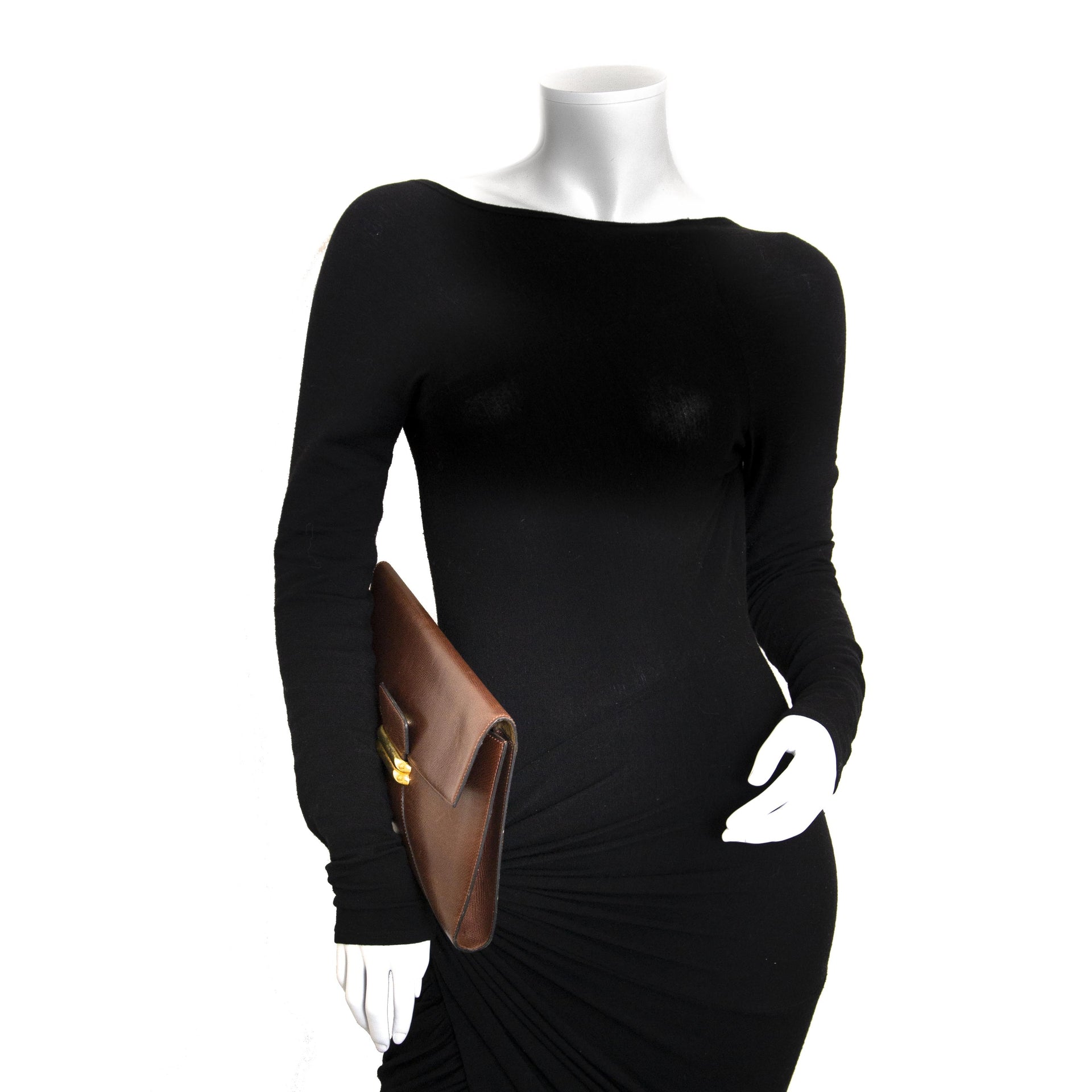 We buy and sell your authentic Delvaux Brown Leather Clutch