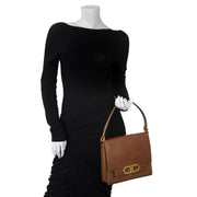 We buy and sell 100% authentic Delvaux Cognac Double D Top Handle Bag
