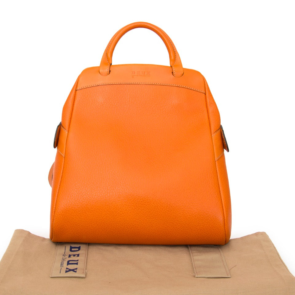 Buy Delvaux Deux Orange Backpack at the right price at LabelLOV vintage webshop. Luxe, vintage, fashion. Safe and secure online shopping. Antwerp, Belgium.