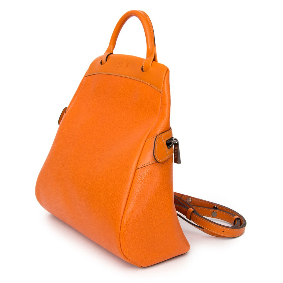 Buy Delvaux Deux Orange Backpack at the right price at LabelLOV vintage webshop. Luxe, vintage, fashion. Safe and secure online shopping. Antwerp, Belgium.