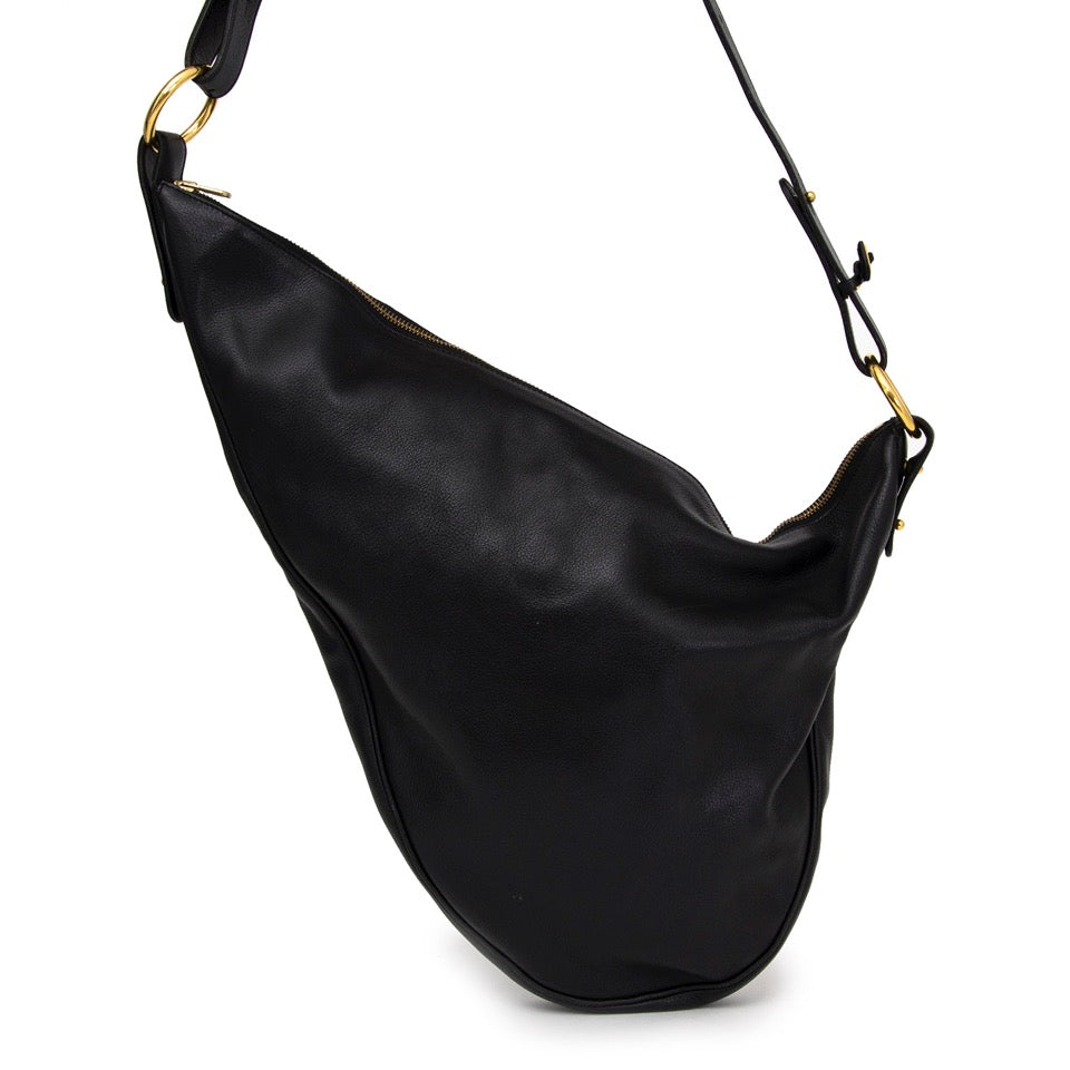 Buy safe online at the best price Delvaux Tentation GM Bag in good, vintage condition. Perfect condition real designer secondhand luxury , worldwide shipping 100% authentic. acheter en ligne pour le meilleur prix sac a main.