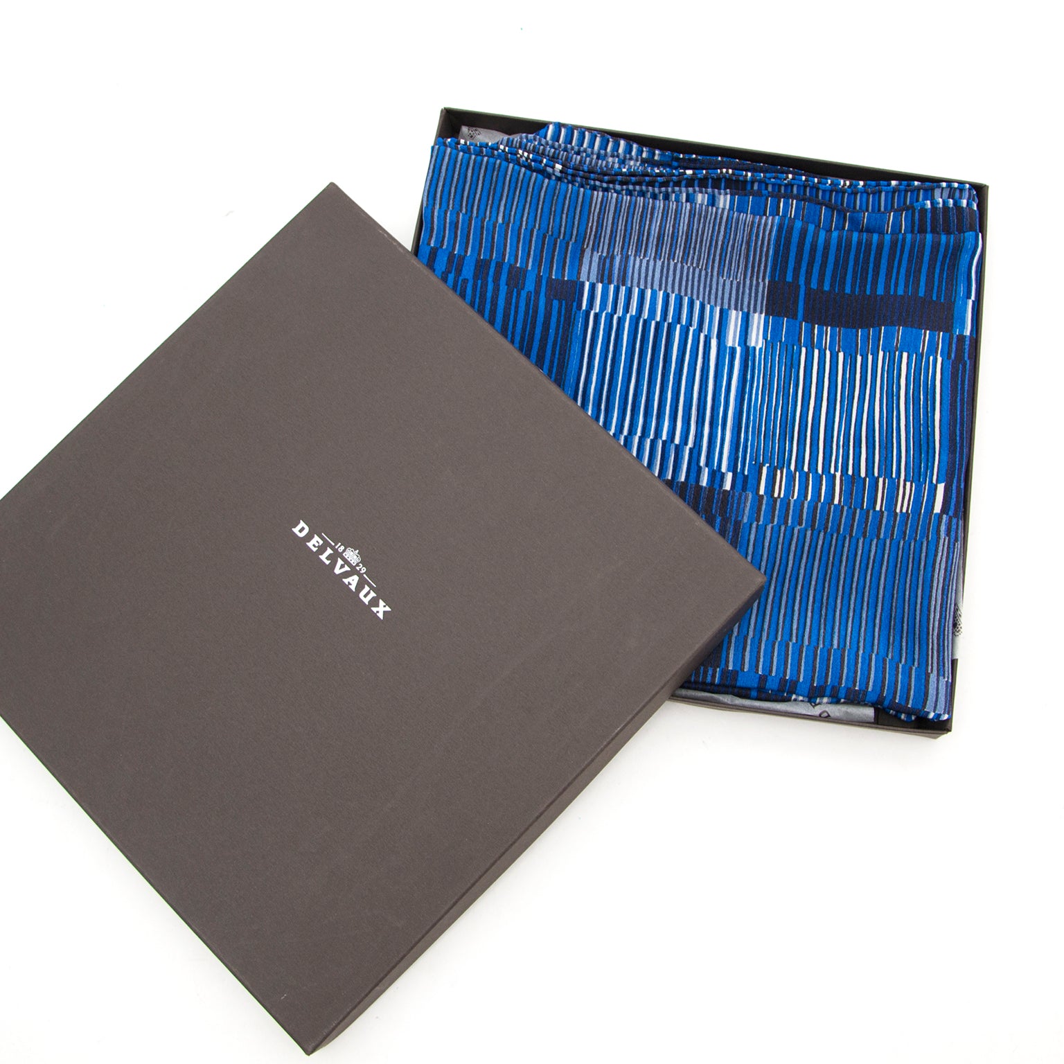 Authentic luxury designer items like Delvaux Blue Striped Silk Scarf at Labellov.com