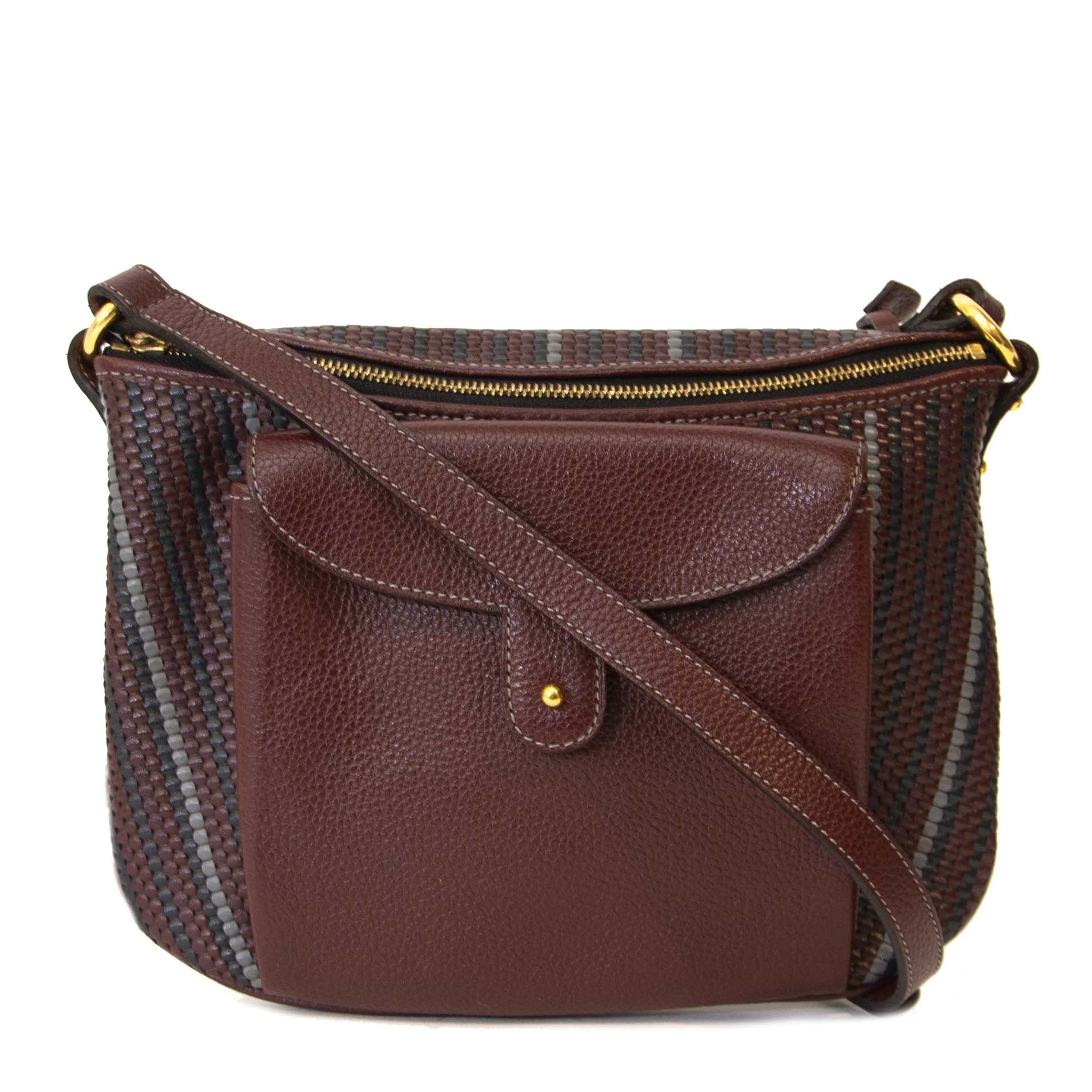 Delvaux Burgundy Toile De Cuir Crossbody Bag at Labellov. Vintage designer handbags