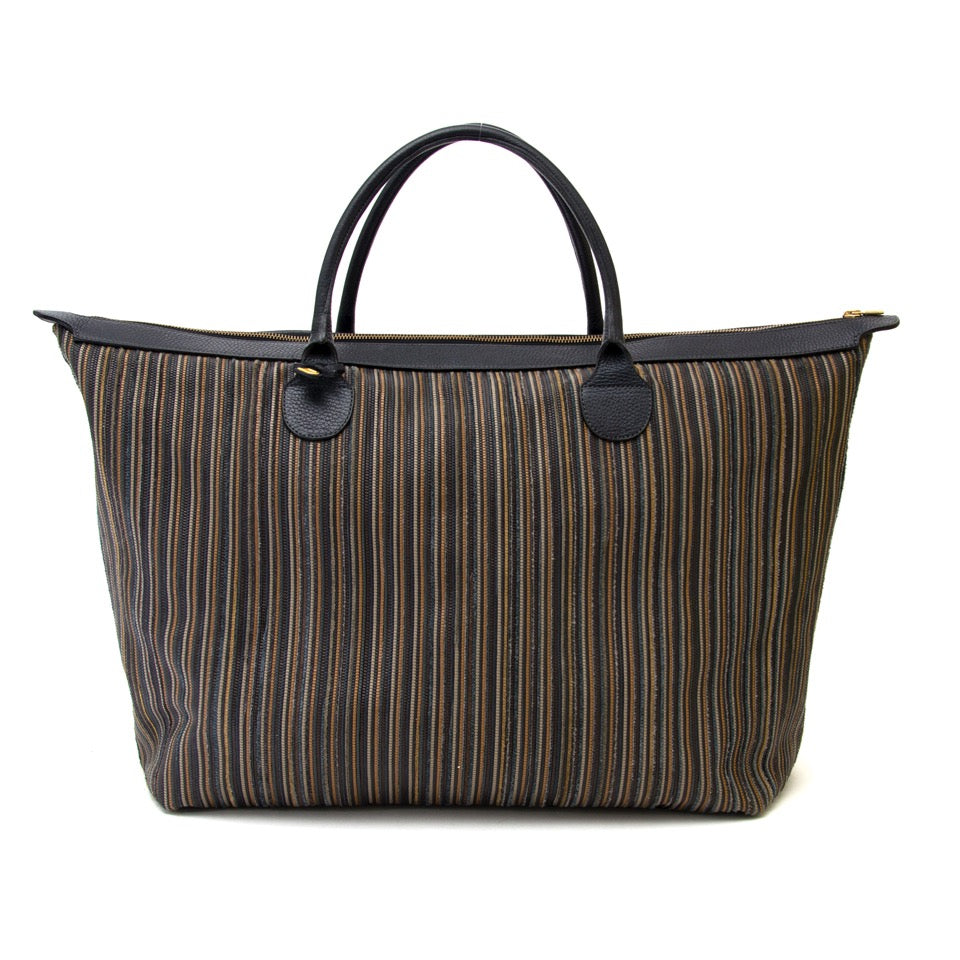 acheter en ligne pour le meilleur prix comme neuf sac a main Delvaux toile de cuir travel bag.
