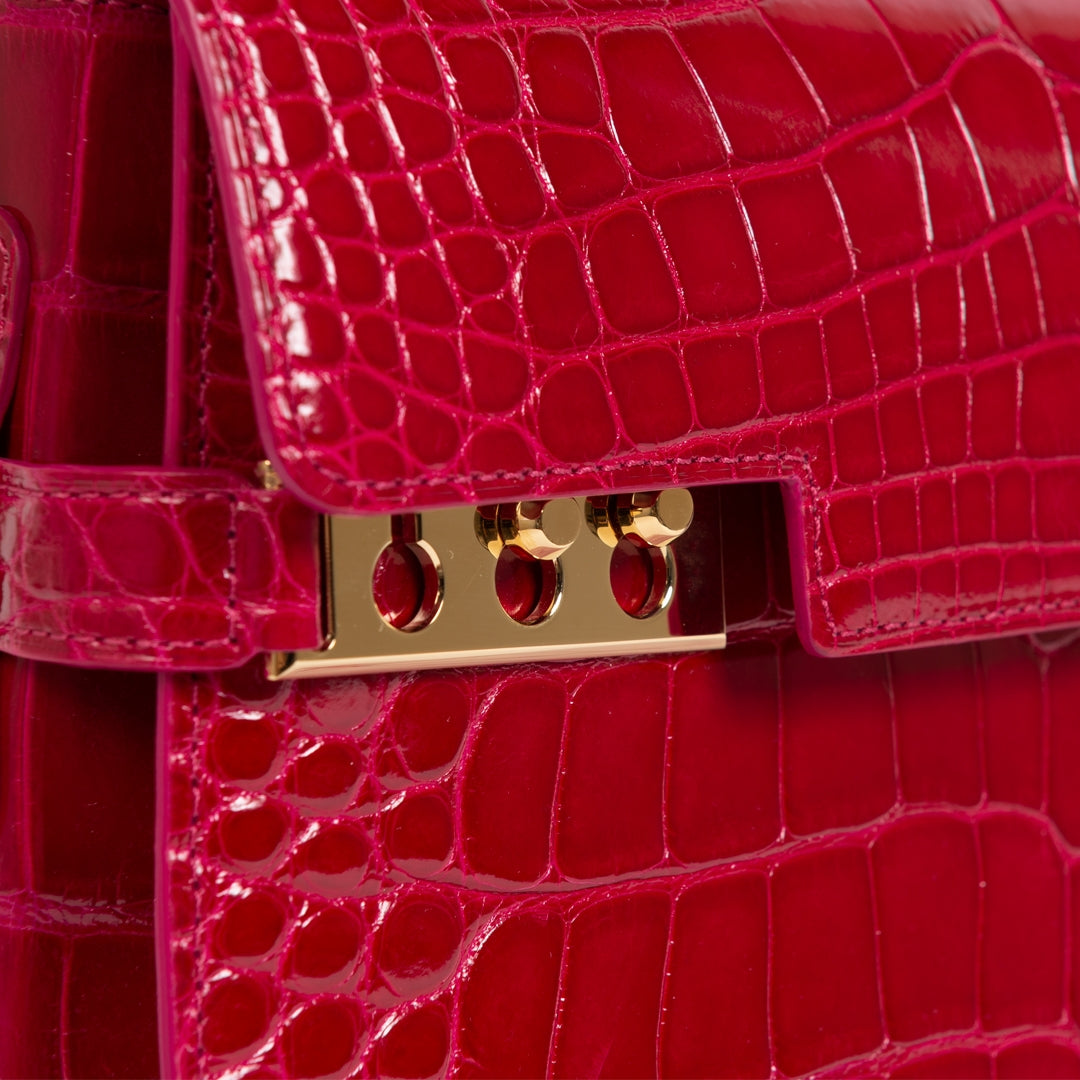 Buy and sell your Delvaux Tempête alligator Framboise MM for the best price