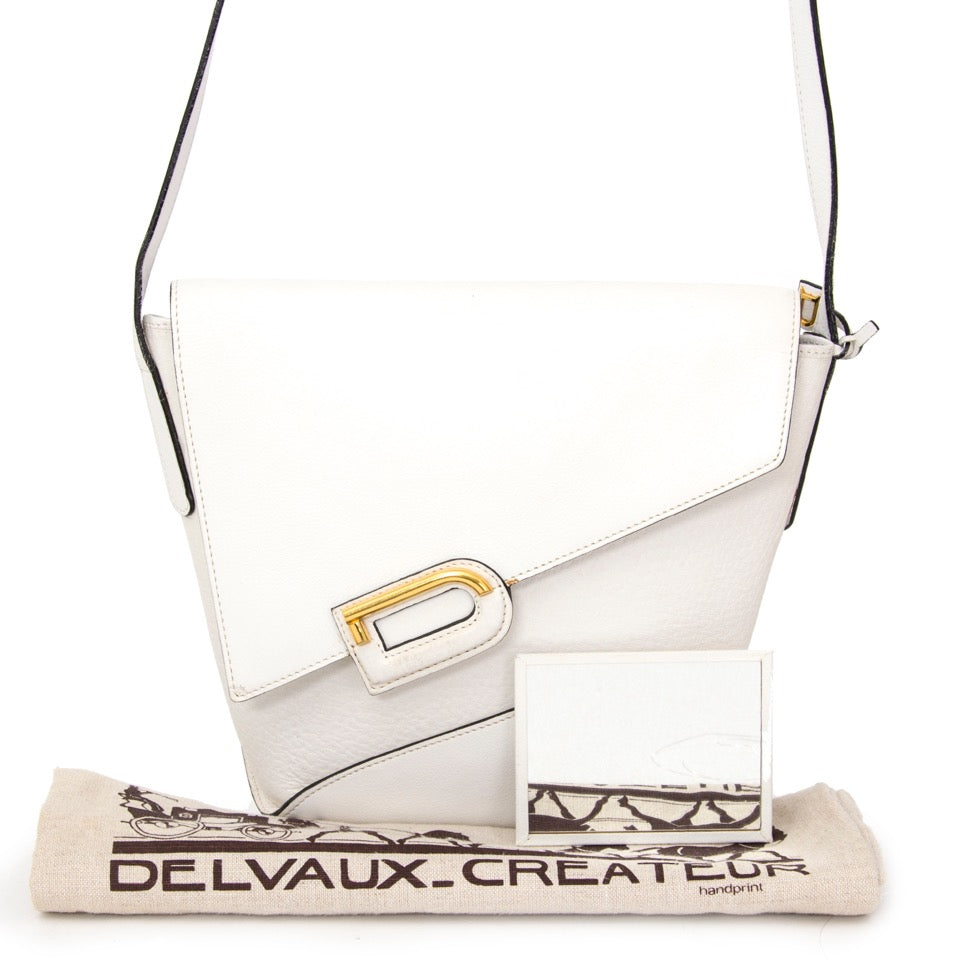 Buy DDelvaux White Shoulder bag at the right price at LabelLOV vintage webshop. Luxe, vintage, fashion. Safe and secure online shopping. Antwerp, Belgium.
