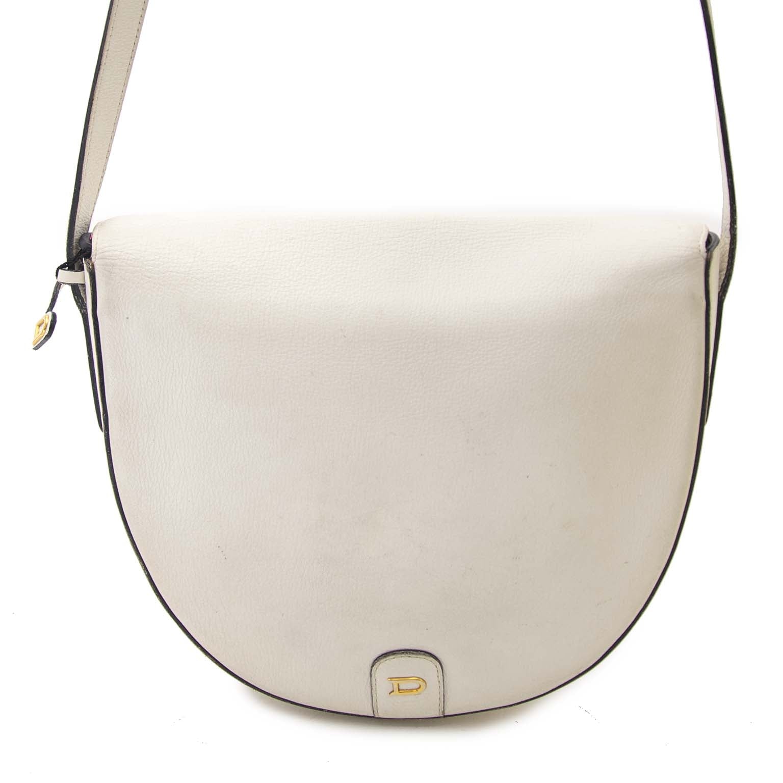 Delvaux White Leather Crossbody Saddle Bag Buy authentic designer Delvaux secondhand bags at Labellov at the best price. Safe and secure shopping. Koop tweedehands authentieke Delvaux tassen bij designer webwinkel labellov.