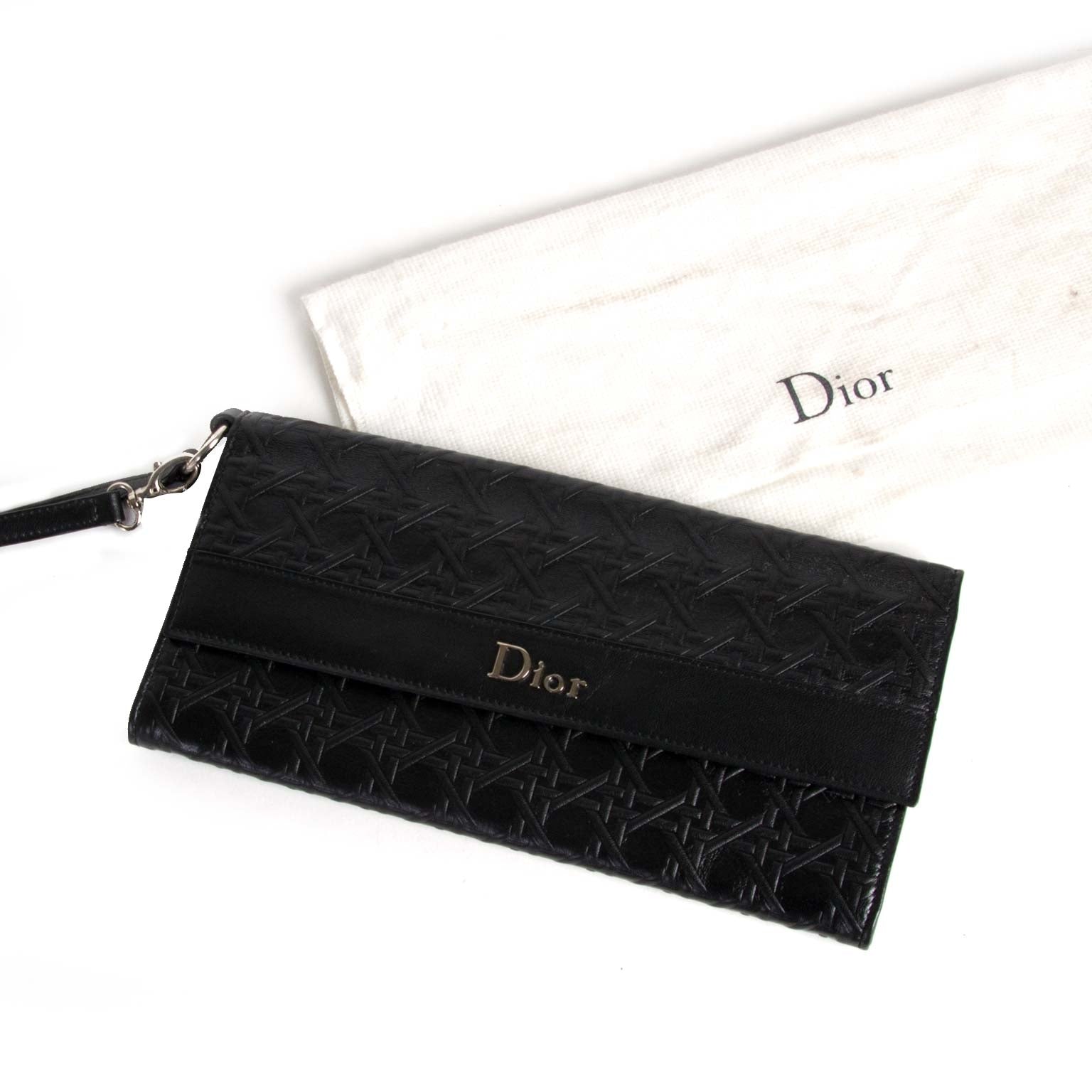 Christian Dior Black Leather Clutch Koop en verkoop uw authentieke designer handtassen aan de beste prijs bij Labellov