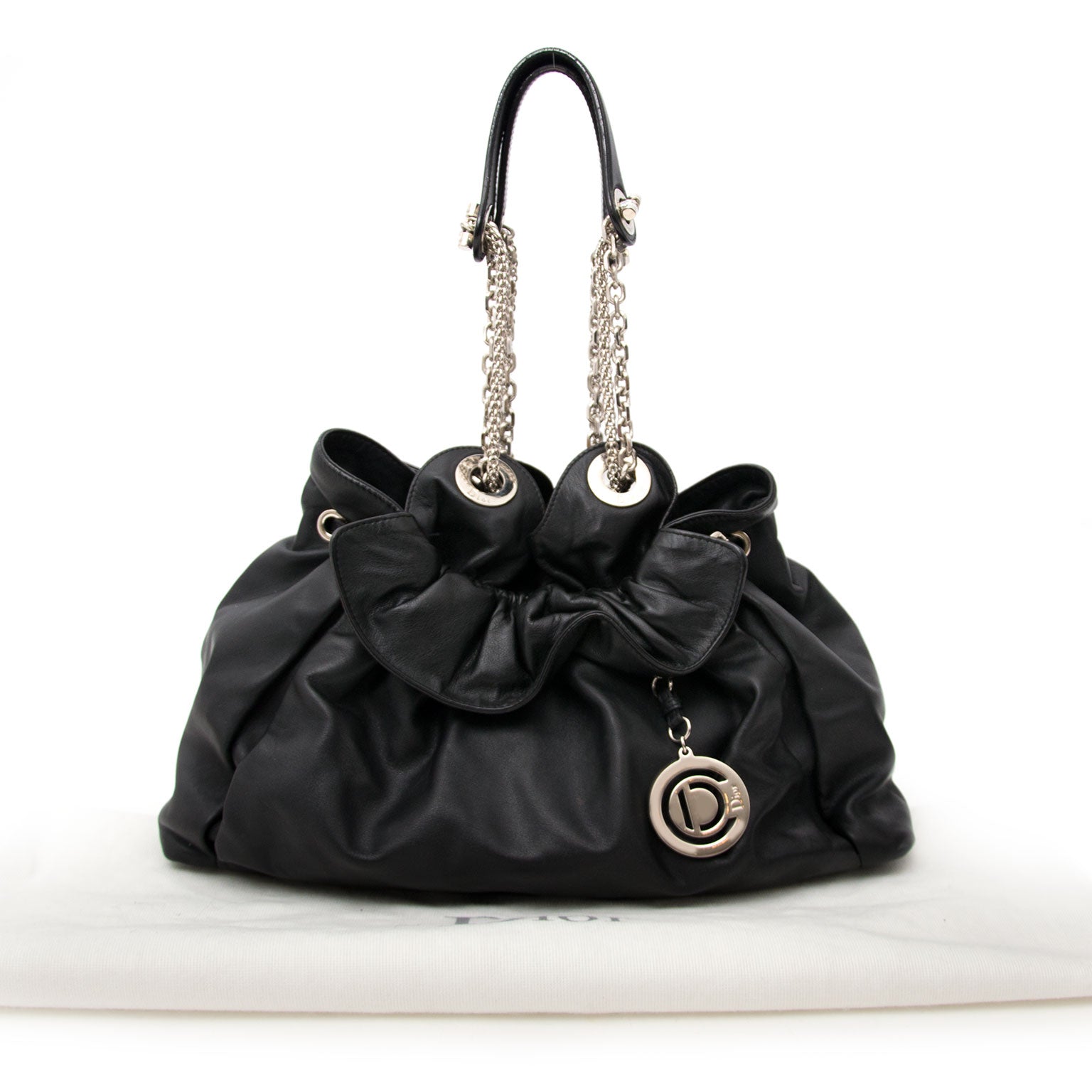 koop jou tweedehands handtas veilig Constructed of supple lambskin leather with Dior's signature 'cannage' stitching throughout exterior.