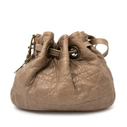 Koop een tweedehands Christian Dior Bronze Cannage Drawstring Bag bij labellov