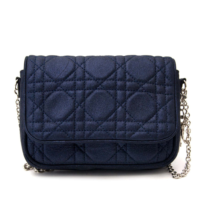 Dior Blue Metallic Crossbody Bag Buy authentic designer Dior secondhand bags at Labellov at the best price. Safe and secure shopping. Koop tweedehands authentieke Dior tassen bij designer webwinkel labellov.