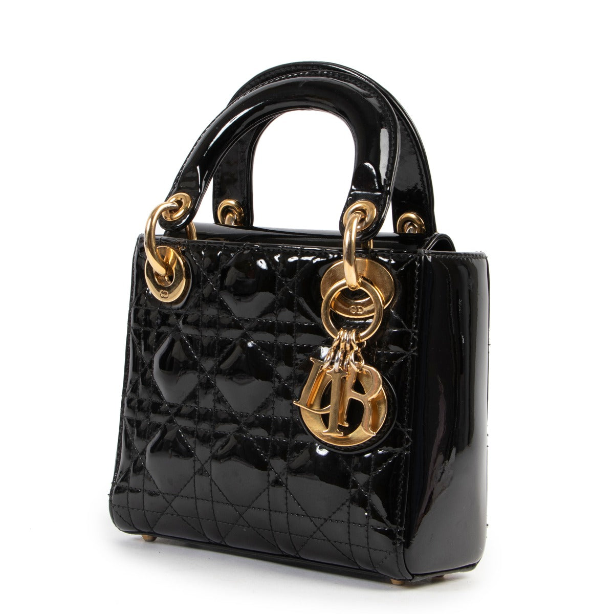 Get this Christian Dior Black Patent Mini Lady Dior at Labellov. Buy and sell your designer items online or in store for a reasonable price and in good condition.