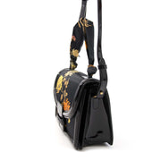 Buy your authentic Dries Van Noten Patent and Oriental Fabric Bag online
