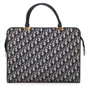 Koop tweedehands monogram laptop tas van Dior bij Labellov Antwerpen.