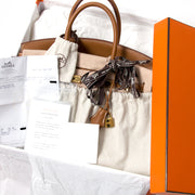 This BRAND NEW Birkin bag is the proof of the craftsmanship of the house of Hermès. It's not only the most sought after bag in the world, but also offers superior quality and impeccable design.