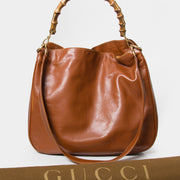 koop veilig online tweedehands aan de juiste beste prijs Gucci Cognac Miss GG Leather Handle Hobo Bag