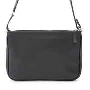 Delvaux pochette with shoulder strap in black Polo clafskin.