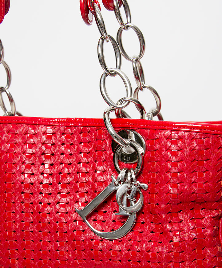 Authentic secondhand Christian Dior red leather soft woven bag at the right price safe secue online shopping labellov designer vintage webshop fashion Antwerp Belgium